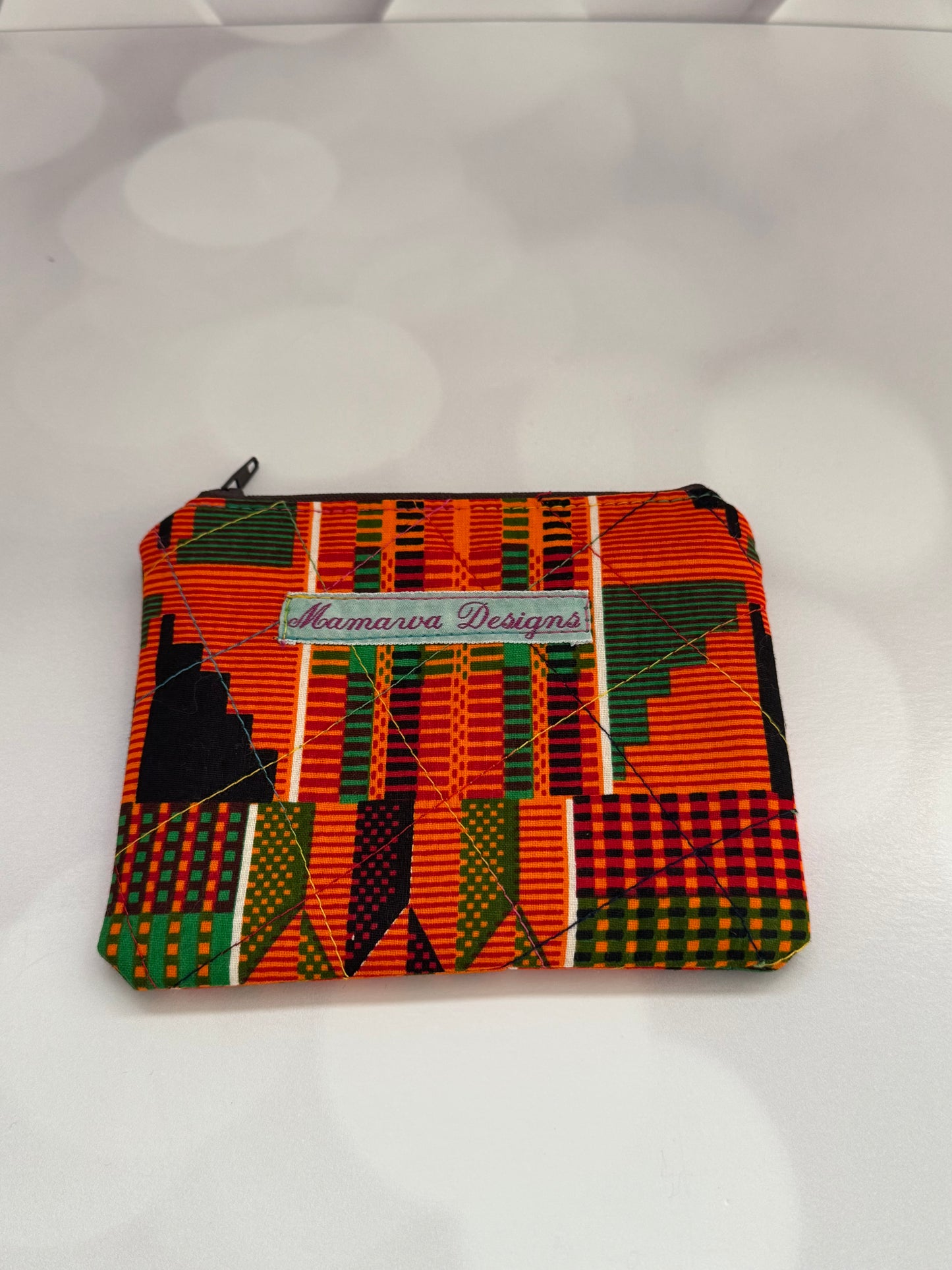 QUILTED AFRICAN ORANGE PRINT COIN/CHANGE POUCH