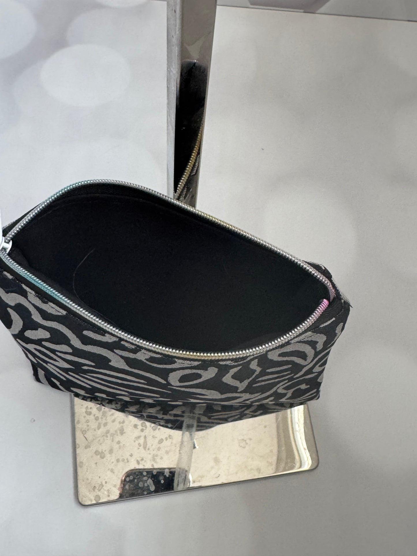 PRINTED BLACK POUCH